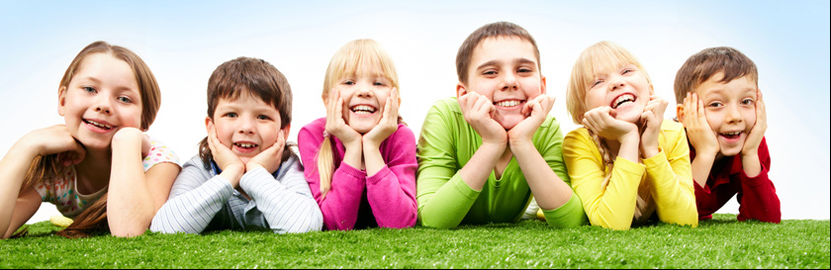 Smiling-Kids-on-Grass-Black-Border